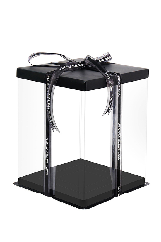 Black gift box with clear sides and a black ribbon on a white background